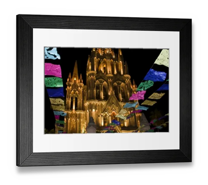 Framed Print : Mexico, San Miguel de Allende. Festival banners fly at night in front of illuminated