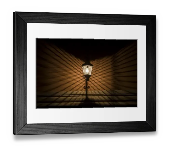 Framed Print : Mexico, San Miguel de Allende. Wire cage lamp at night creates shadow pattern on wall Framed Print : Mexico, San Miguel de Allende. Wire cage lamp at night creates shadow pattern on wall