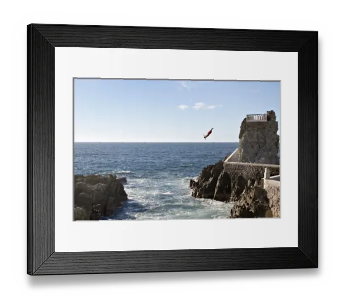 Framed Print : North America, Mexico, Mazatlan. Cliff diver (clavadista) diving from El Mirador at Paseo Claussen Framed Print : North America, Mexico, Mazatlan. Cliff diver (clavadista) diving from El Mirador at Paseo Claussen