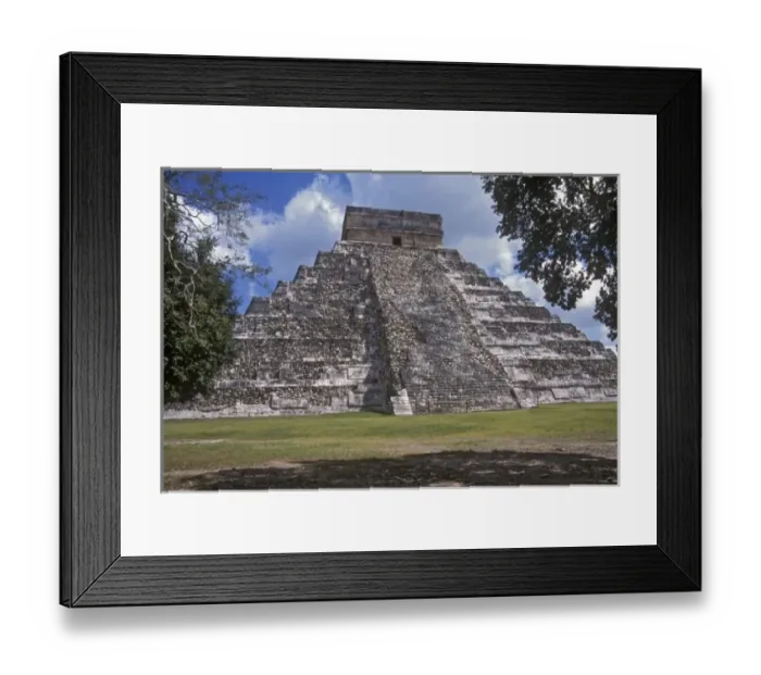 Framed Print : Tourists walk past an unrestored side of El Castillo, one of the Mayan structures in Chichen Itza Framed Print : Tourists walk past an unrestored side of El Castillo, one of the Mayan structures in Chichen Itza