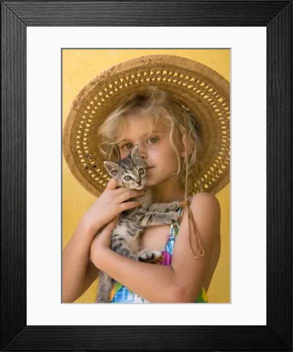Framed Print : Mexico. Young girl embraces her kitten. (MR)