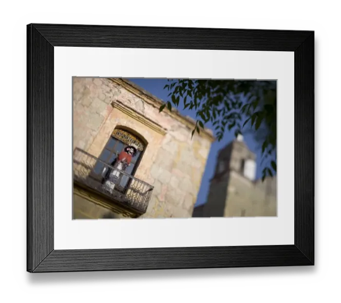 Framed Print : Mexico, Oaxaca, Morning sun lights Day of the Dead skeleton posed on balcony window Framed Print : Mexico, Oaxaca, Morning sun lights Day of the Dead skeleton posed on balcony window
