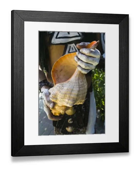 Framed Print : Mexico, Guerrero, Zihuatanejo. Young Man in Mayan Costume (MR) holding large Conch Shell Framed Print : Mexico, Guerrero, Zihuatanejo. Young Man in Mayan Costume (MR) holding large Conch Shell
