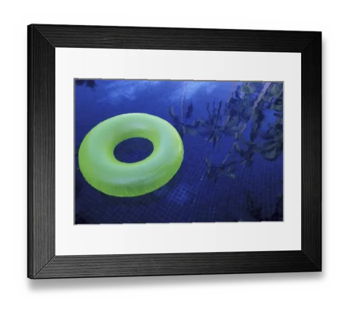 Framed Print : North America, Mexico, Jalisco, Puerto Vallarta. Green innertube in hotel pool Framed Print : North America, Mexico, Jalisco, Puerto Vallarta. Green innertube in hotel pool