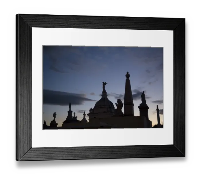 Framed Print : Nicaragua, Granada. Silhouettes of crosses and angels on top of graves in cemetery at sunset Framed Print : Nicaragua, Granada. Silhouettes of crosses and angels on top of graves in cemetery at sunset