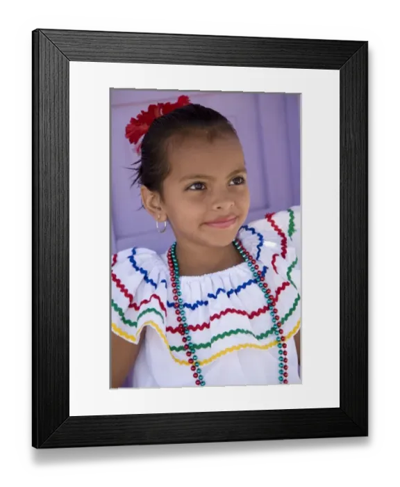 Framed Print : Nicaragua, Granada. Girl in traditional dress after dance in Villa Esperanza barrio. (MR) Framed Print : Nicaragua, Granada. Girl in traditional dress after dance in Villa Esperanza barrio. (MR)