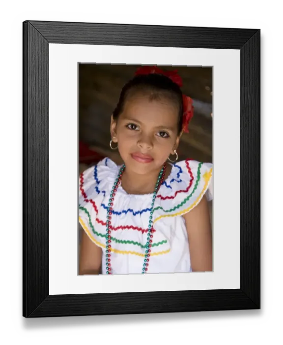 Framed Print : Nicaragua, Granada. Girl in traditional dress after dance in Villa Esperanza barrio. (MR) Framed Print : Nicaragua, Granada. Girl in traditional dress after dance in Villa Esperanza barrio. (MR)