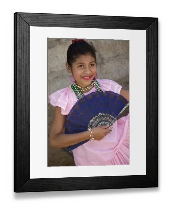 Framed Print : Nicaragua, Granada. Girl with fan in traditional dress after dance in Villa Esperanza barrio Framed Print : Nicaragua, Granada. Girl with fan in traditional dress after dance in Villa Esperanza barrio
