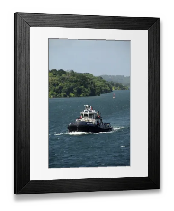 Framed Print : Central America, Panama, Panama Canal. Tug boat that helps ships transit the Panama Canal