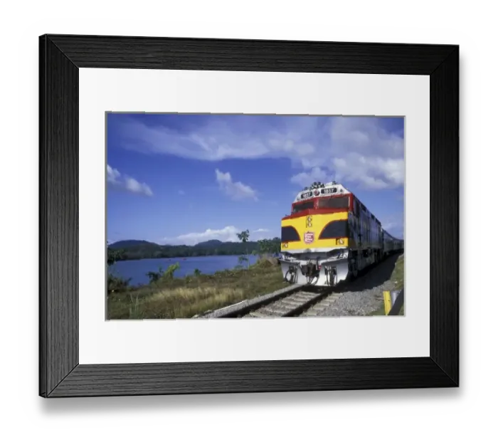 Framed Print : Panama, Gamboa, Panama Canal Locomotive races down tracks along Panama Canal in early Framed Print : Panama, Gamboa, Panama Canal Locomotive races down tracks along Panama Canal in early