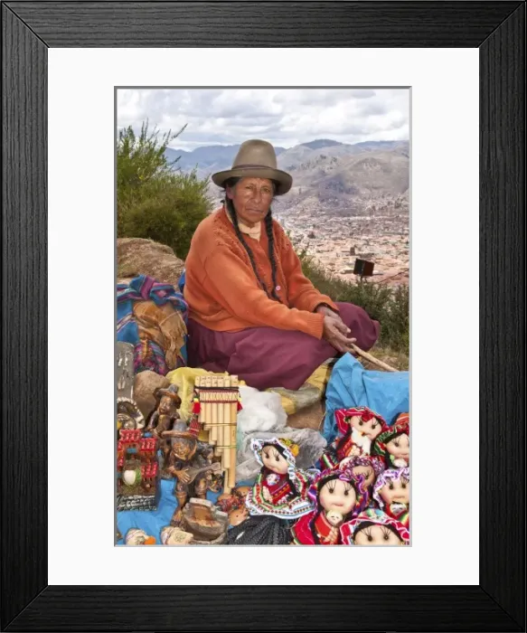 Framed Print : Traditional woman with colorful clothes selling souvenirs in religious region Saqsayhuaman Framed Print : Traditional woman with colorful clothes selling souvenirs in religious region Saqsayhuaman