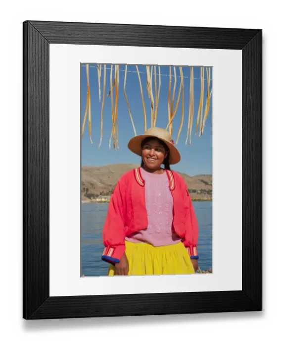 Framed Print : Lake Titicaca Peru with local traditional woman of Uros Tribe history in colorful Framed Print : Lake Titicaca Peru with local traditional woman of Uros Tribe history in colorful