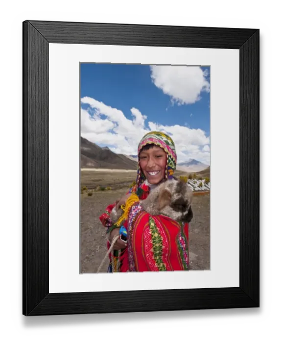 Framed Print : High peak at 13, 000 feet of La Raya Peru with young boy with llama portrait (MR) Framed Print : High peak at 13, 000 feet of La Raya Peru with young boy with llama portrait (MR)