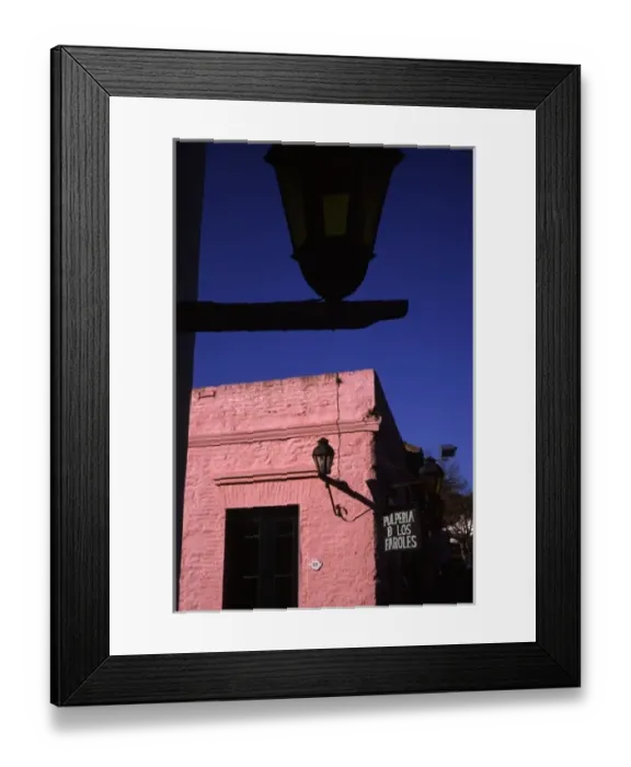 Framed Print : Colonia, Uruguay, Lamppost and colonial era building in Barrio Historico