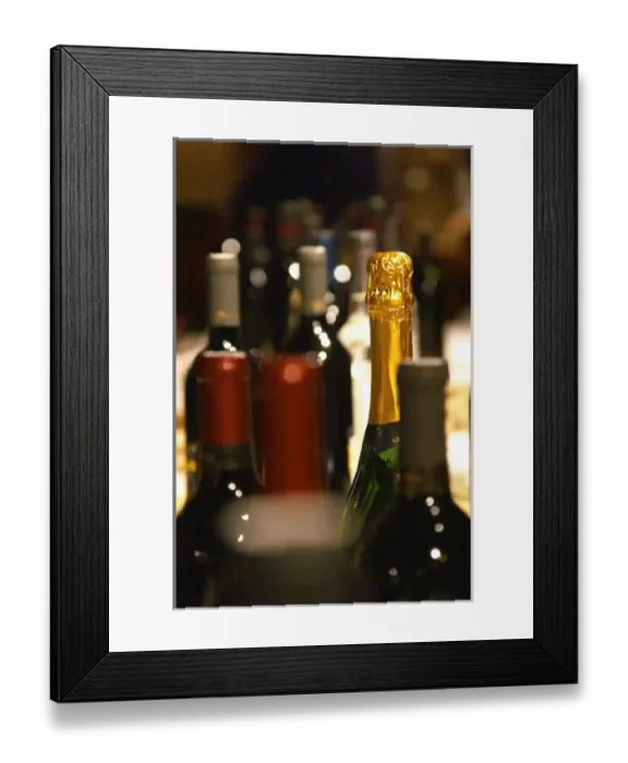 Framed Print : Bottles of wine and sparkling wine on a table for a tasting. Montevideo, Uruguay Framed Print : Bottles of wine and sparkling wine on a table for a tasting. Montevideo, Uruguay
