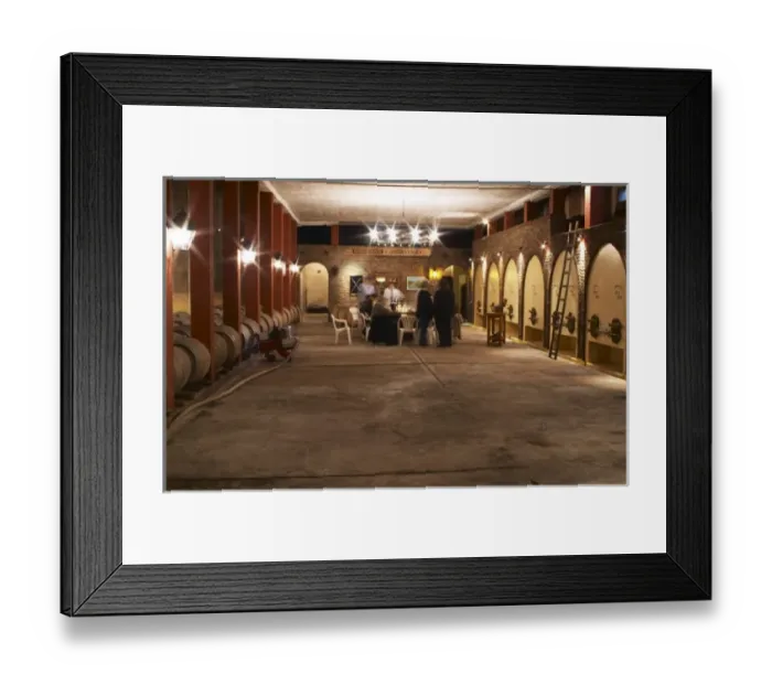 Framed Print : The winemaker and oenologist and a group of wine tasters tasting in the cellar. Bodega Framed Print : The winemaker and oenologist and a group of wine tasters tasting in the cellar. Bodega