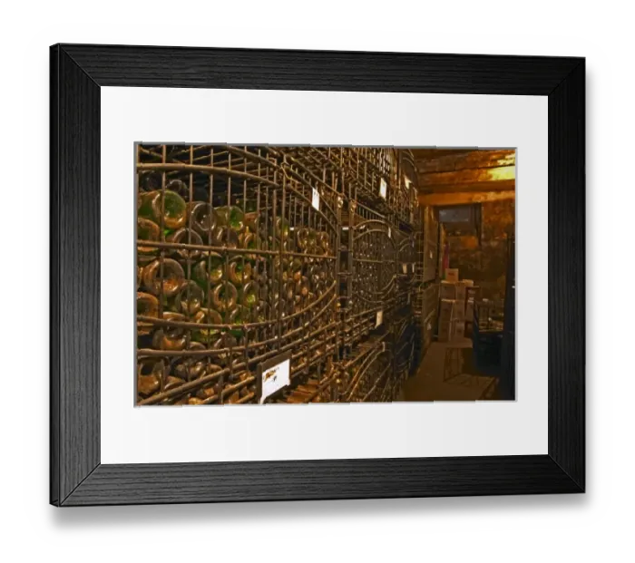 Framed Print : The private bottle aging cellar with hundreds, thousands of bottles in metal wrought