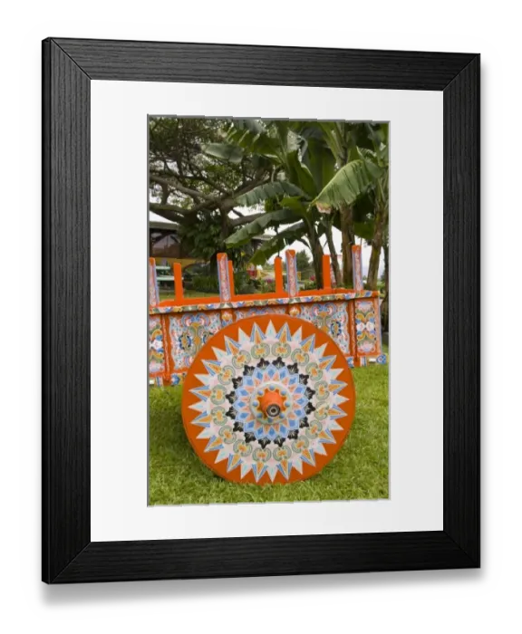 Framed Print : Colorful close up of famous wheel for carriages that are traditional in and around Framed Print : Colorful close up of famous wheel for carriages that are traditional in and around
