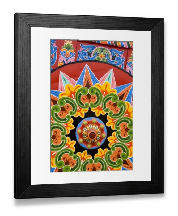 Framed Print : Colorful close up of famous wheel for carriages that are traditional in and around Framed Print : Colorful close up of famous wheel for carriages that are traditional in and around