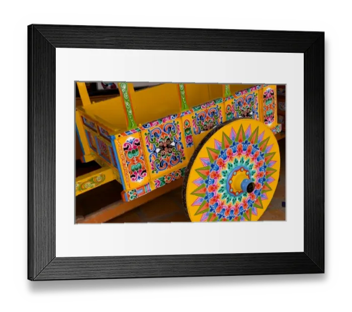 Framed Print : Colorful close up of famous wheel for carriages that are traditional in and around Framed Print : Colorful close up of famous wheel for carriages that are traditional in and around
