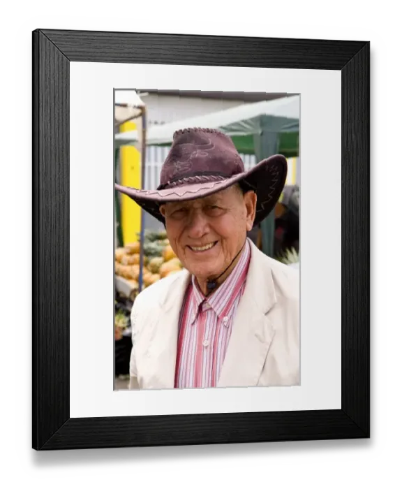 Framed Print : Portrait of smiling local man in Central Market with fruits and vegetables in Pavas Framed Print : Portrait of smiling local man in Central Market with fruits and vegetables in Pavas