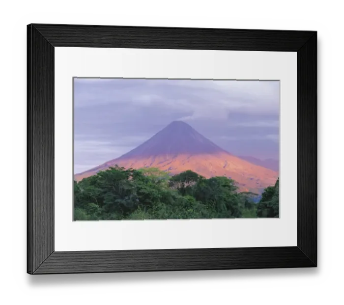 Framed Print : Sunset light peers through the clouds to illuminate the flanks of Arenal Volcano (1 Framed Print : Sunset light peers through the clouds to illuminate the flanks of Arenal Volcano (1