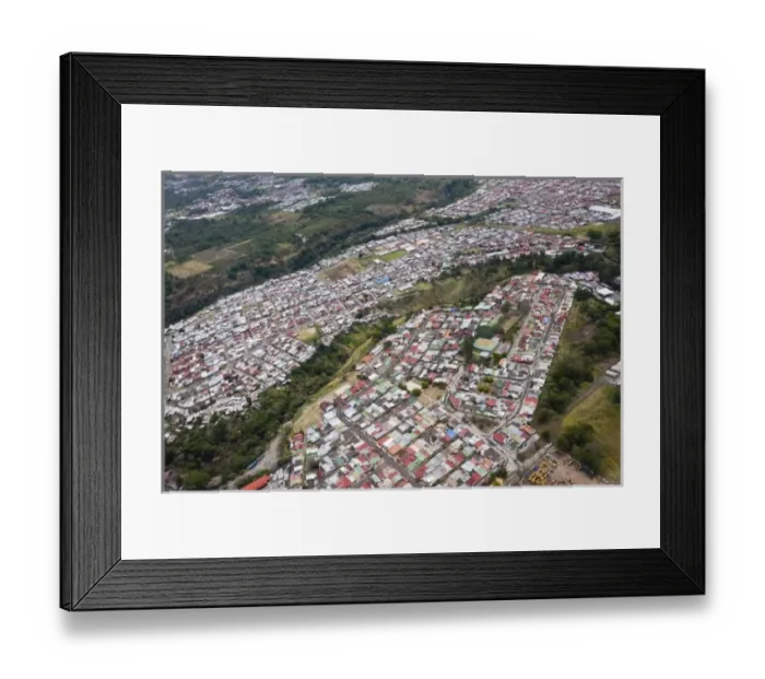 Framed Print : Homes in a densely populated neighborhood of San Jose, Costa Rica as seen from above Framed Print : Homes in a densely populated neighborhood of San Jose, Costa Rica as seen from above
