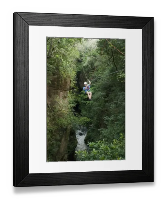 Framed Print : Canopy Tour, Rio Blanco canyon, Hacienda Guachapelin, Rincon de la Vieja, Costa Rica, model released
