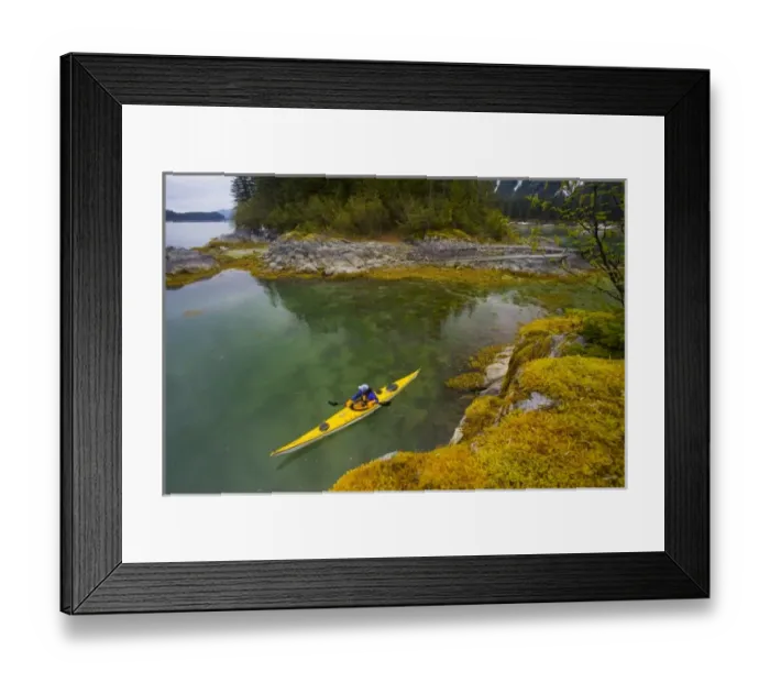 Framed Print : USA, Alaska, Glacier Bay National Park. Woman sea kayaker in Dundas bay. (MR)