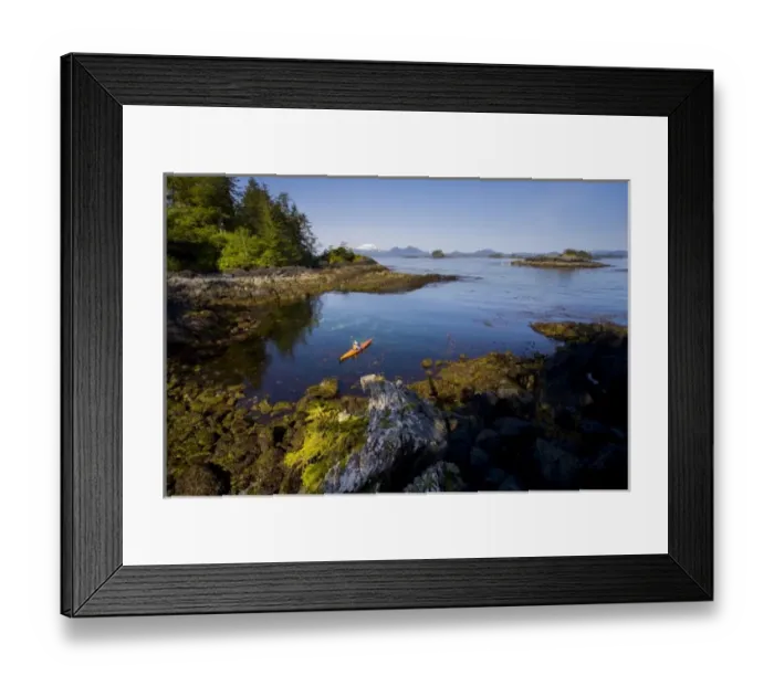 Framed Print : USA, Alaska, Sitka Sound. Woman sea kayaker on calm sea near Kruzof Island, Mt. Edgecumbe Framed Print : USA, Alaska, Sitka Sound. Woman sea kayaker on calm sea near Kruzof Island, Mt. Edgecumbe