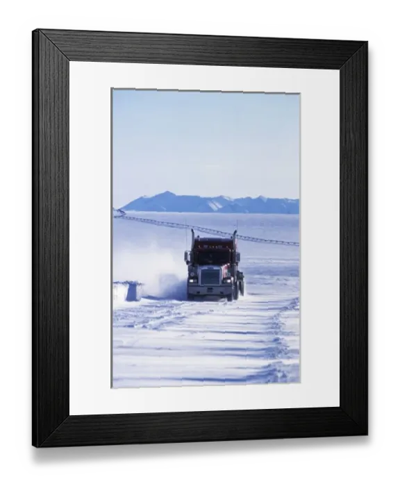 Framed Print : USA, Alaska, North Slope. Truck on the snow-covered Dalton highway with Trans-Alaska