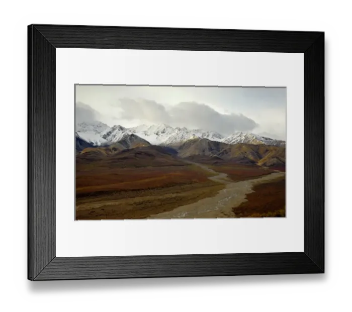 Framed Print : The rich colors of Polychrome Pass are set off by jagged peaks and braided streams Framed Print : The rich colors of Polychrome Pass are set off by jagged peaks and braided streams
