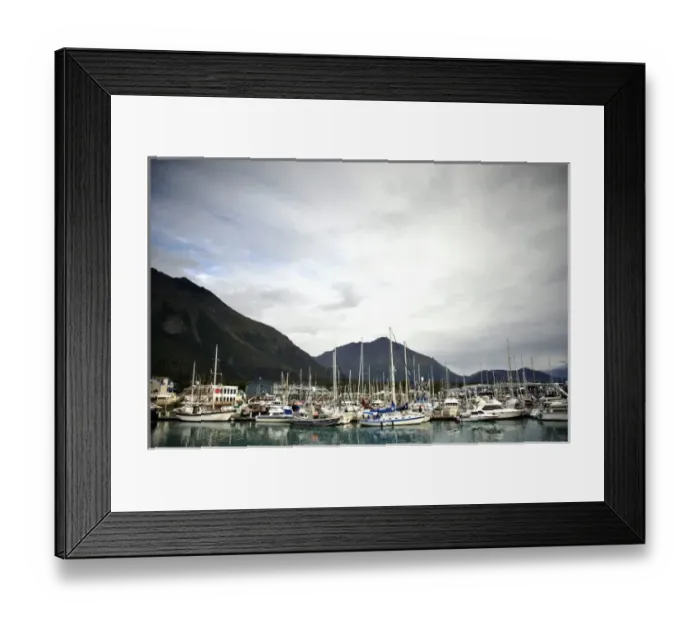 Framed Print : Private and Commercial Boats lie in Seward harbor amongst breaking skies Framed Print : Private and Commercial Boats lie in Seward harbor amongst breaking skies