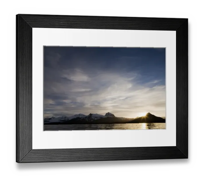 Framed Print : USA, Alaska, Katmai National Park, Setting sun lights clouds above mountain peaks