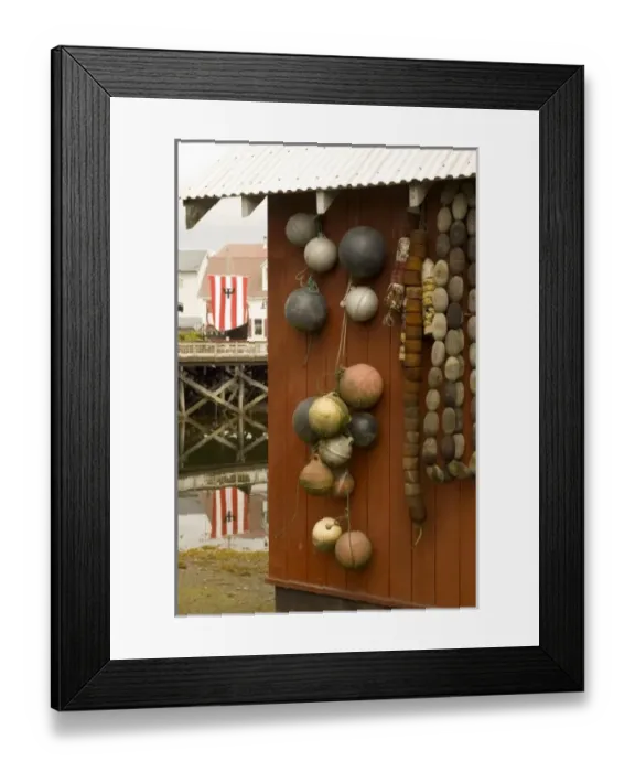 Framed Print : North America, USA, AK, Inside Passage. Commercial fishing accoutrements hang on building Framed Print : North America, USA, AK, Inside Passage. Commercial fishing accoutrements hang on building
