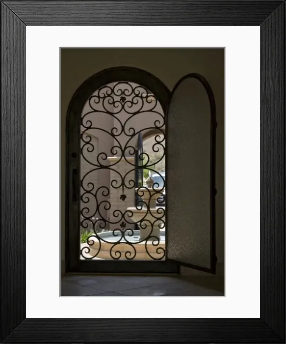 Framed Print : USA, Arizona, Buckeye. View of fountain through open door of home in Verrado Village Framed Print : USA, Arizona, Buckeye. View of fountain through open door of home in Verrado Village