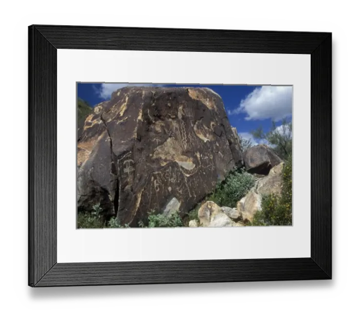 Framed Print : Petroglyphs that the Hohokam carved into stone at the White Tank Mountain Regional Framed Print : Petroglyphs that the Hohokam carved into stone at the White Tank Mountain Regional