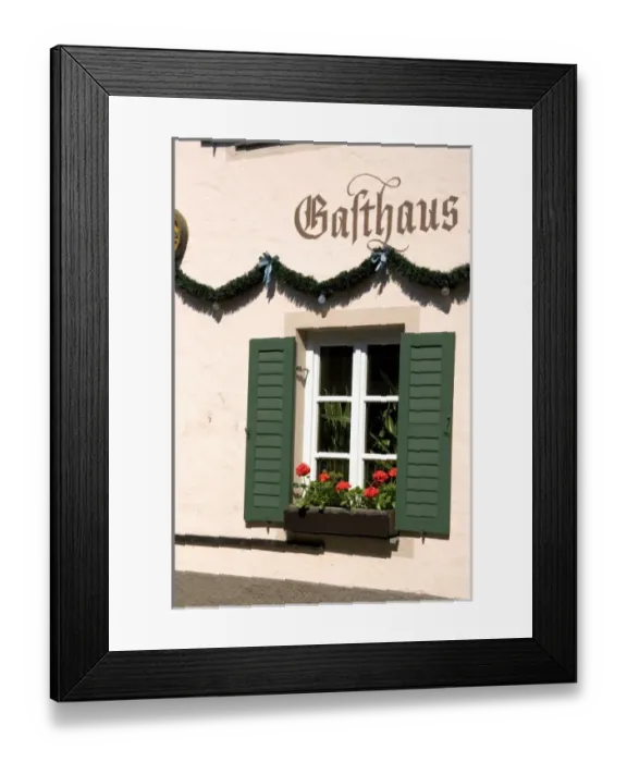 Framed Print : Window with flower box on a hotel in the alpine village of Garmisch, Germany Framed Print : Window with flower box on a hotel in the alpine village of Garmisch, Germany