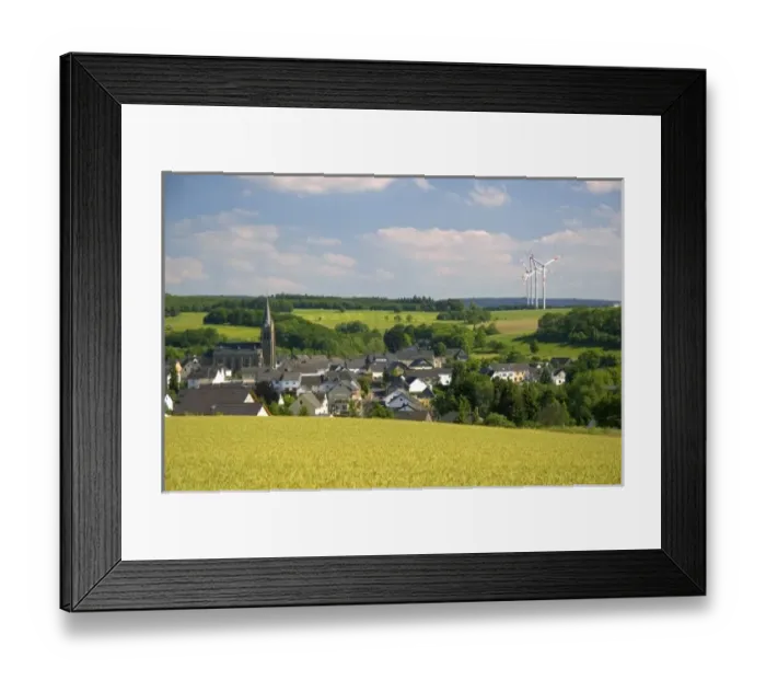 Framed Print : Electricity wind generators near a village in northwest Germany Framed Print : Electricity wind generators near a village in northwest Germany