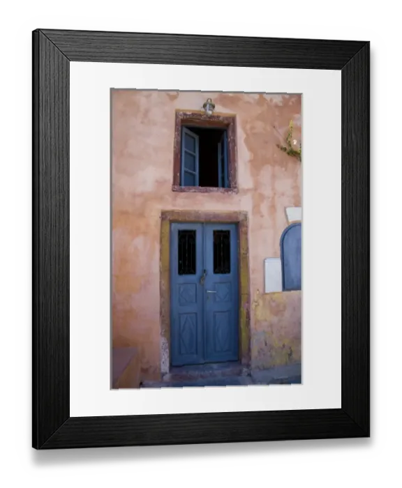 Framed Print : Greece and Greek Island of Santorini town of Oia with blue doorway and blue shuttered
