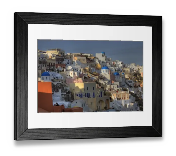 Framed Print : Greece, Santorini, Oia town in evening light with all the colorful buildings Framed Print : Greece, Santorini, Oia town in evening light with all the colorful buildings