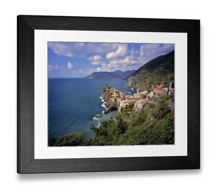 Framed Print : Europe, Italy, Vernazza. Red-tiled buildings look over the azure waters of the Mediterranean