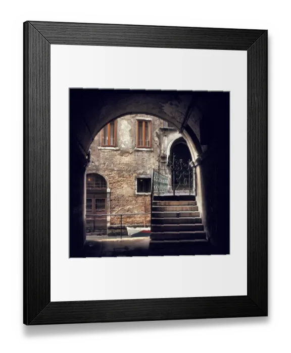 Framed Print : A delicate wrought iron gate marks the entrance to an old home on a small canal in Venice Framed Print : A delicate wrought iron gate marks the entrance to an old home on a small canal in Venice