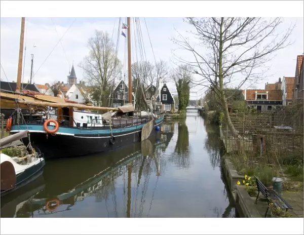 Netherlands, North Holland, Edam, Ship works with vintage canal boats