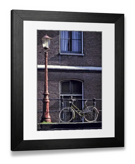 Framed Print : Europe, Netherlands, Amsterdam. Near a striking red lampost, a bicycle waits for its rider Framed Print : Europe, Netherlands, Amsterdam. Near a striking red lampost, a bicycle waits for its rider