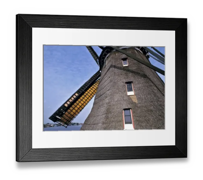 Framed Print : Europe, Netherlands, Amsterdam. A close-up of a windmill shows its thatched sides Framed Print : Europe, Netherlands, Amsterdam. A close-up of a windmill shows its thatched sides