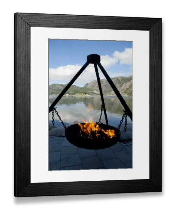 Framed Print : Norway, Stavanger, Lysefjord (aka Lyse Fjord). Warming fire at coastal resort along