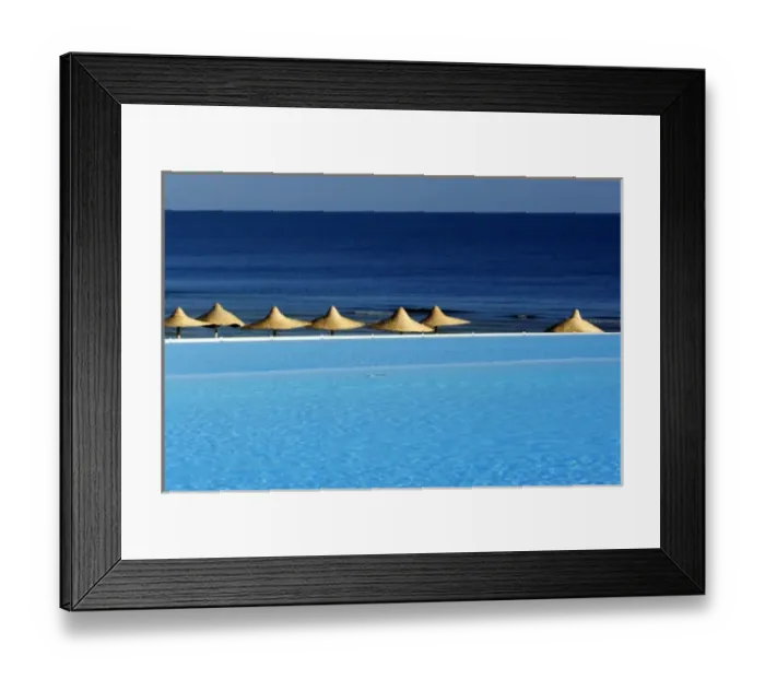Framed Print : Africa, Egypt, Marsa Alam, Red Sea, beachside pool and umbrellas