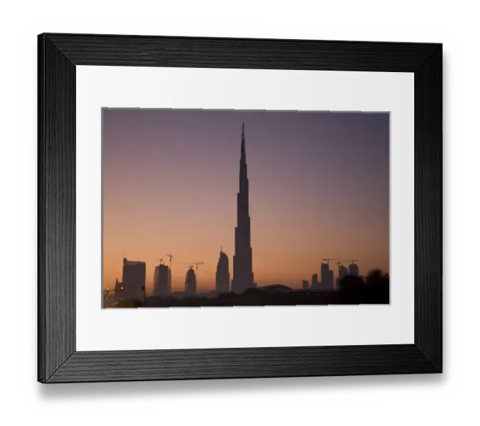 Framed Print : UAE, Dubai. Burj Dubai Hotel and surrounding buildings at sunrise