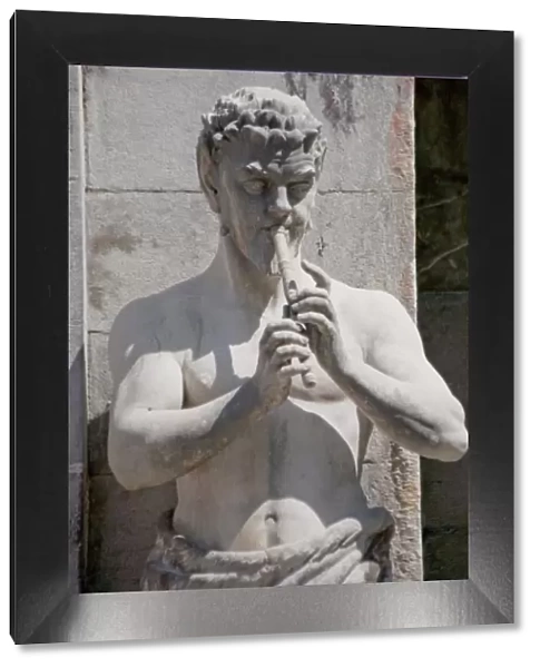 Statue of Pan, the flutist of Greek mythology as the pastoral god of fertility at Massandra Chateau